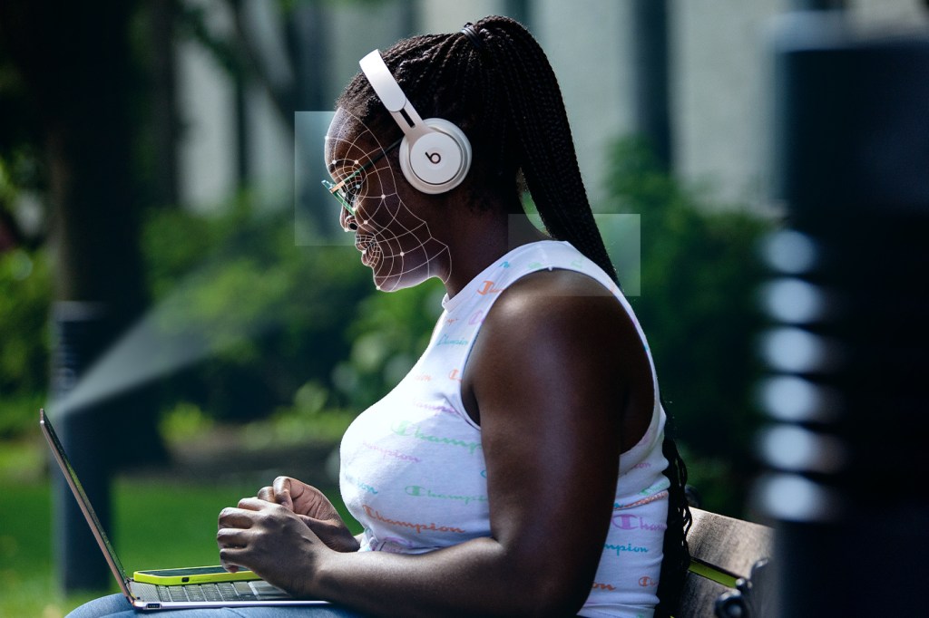 woman wearing white shirt and headphones with illustration over her face