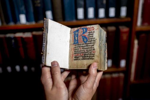 Dragon Prayer Book, Northeastern's medieval manuscript. Photo by Matthew Modoono/Northeastern University