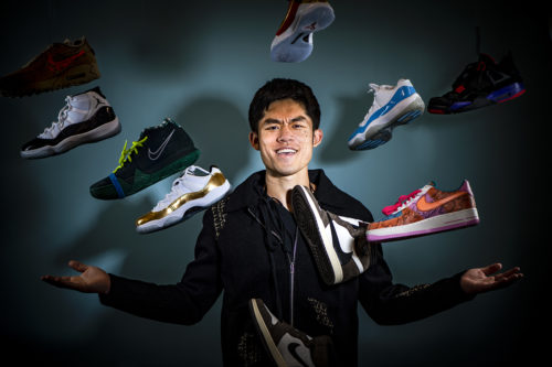 09/13/21 - BOSTON, MA - Yuhong Su, a Business and Design combined major from Dongguan, China, models with some of his sneaker collection on Monday, Sept. 13, 2021. Su began collecting sneakers at Pinkerton Academy in New Hampshire in 2014. Sneakers are more than a hobby, they are a lifestyle for him, which is why he began the Huskick's Sneakers Club. Photo by Alyssa Stone/Northeastern University