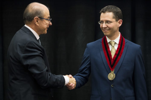 Associate professor of philosophy Rory Smead was installed Thursday as the inaugural Ronald L. and Linda A. Rossetti Professor for the Humanities. <i>Photo by Adam Glanzman/Northeastern University</i>