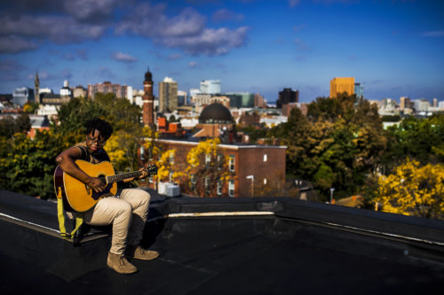 Anjimile Chithambo, a senior at Northeastern who won the title of “WBUR’s Favorite Massachusetts Entry” after submitting an original song to NPR’s Tiny Desk Contest, poses for portrait on October 10, 2018. Photo by Adam Glanzman/Northeastern University