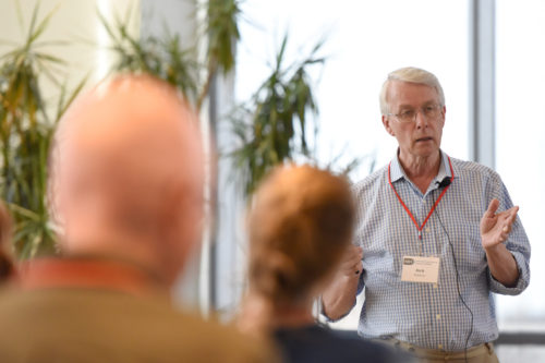 Sir Richard Roberts, Nobel laureate and Distinguished University Professor, gives the keynote address at the  Advanced DNA Sequencing Technology Development Meeting of the National Human Genome Research Institute, which was hosted by Northeasern this week. <i>Photo by Matthew Modoono/Northeastern University</i>