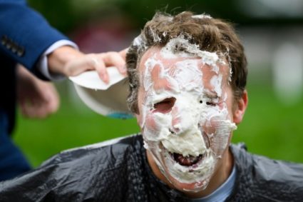 Students engage during the Pie an AEPI event held on Krentzman Quad on Tuesday, Sept. 20, 2022. All proceeds -- which come from members of the Northeastern community donating money to toss a pie into their friends' faces -- benefit The American Cancer Society Relay for Life. Photo by Matthew Modoono/Northeastern University