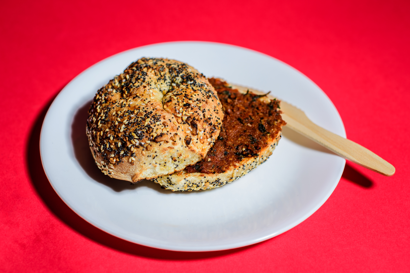 sesame and poppyseed bagel on a plate