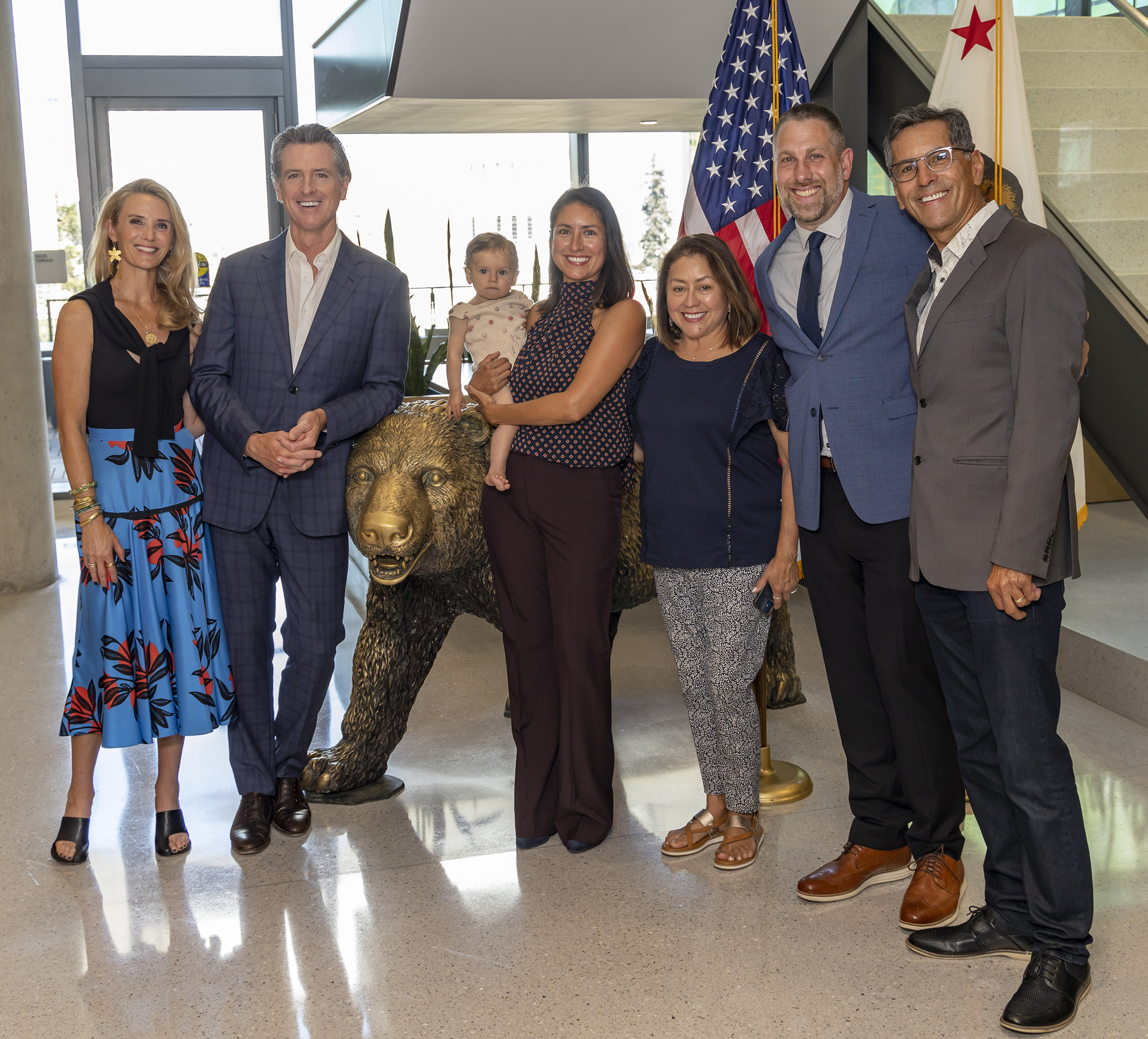 Yana Garcia posing with her family and Governor Gavin Newsom
