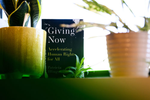 Giving Now book standing up on a table