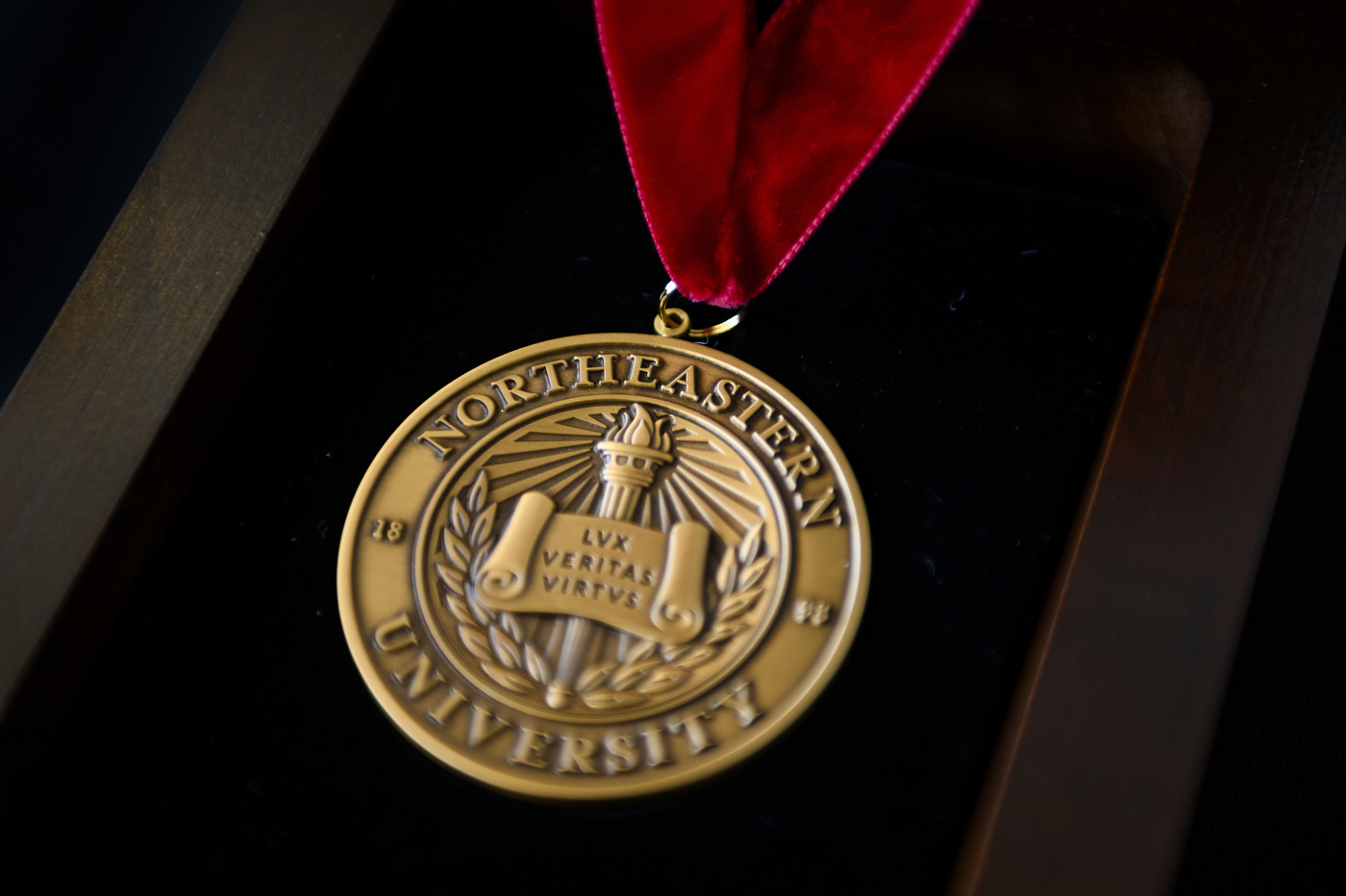 gold northeastern medal