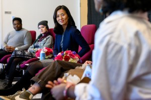 mayor michelle wu sitting with other people