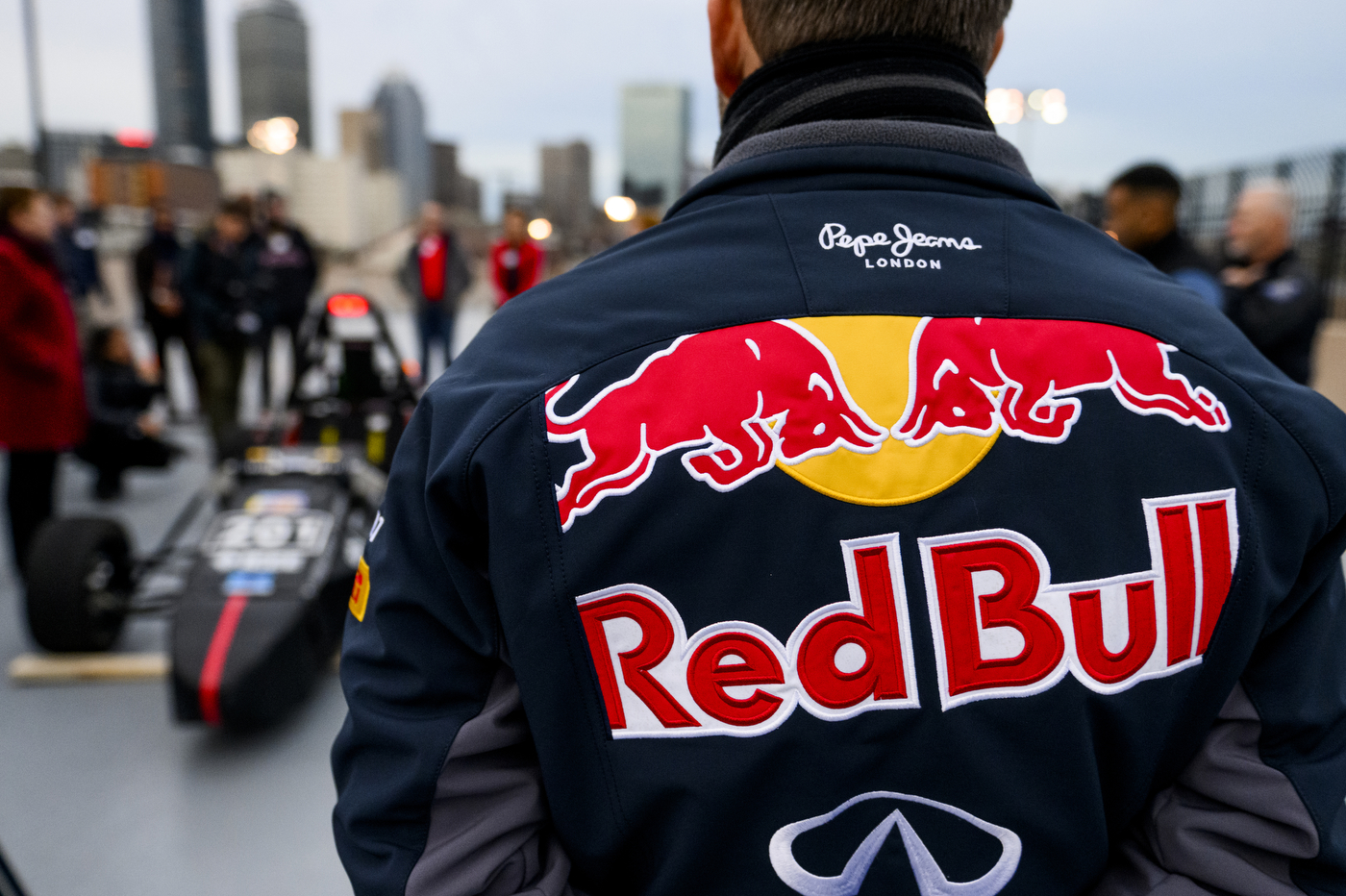 Person wearing Red Bull jacket