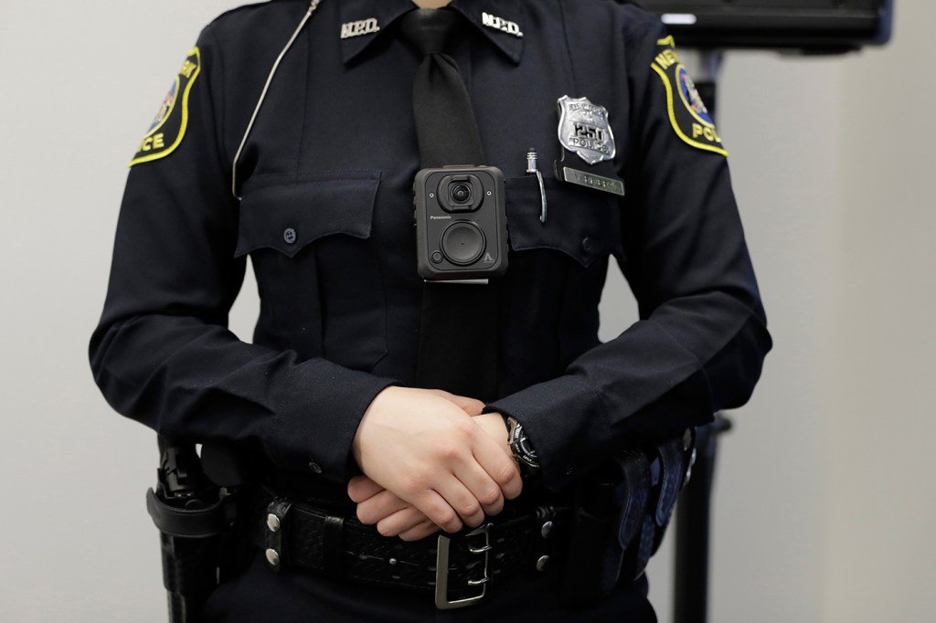 police officer standing with hands folded