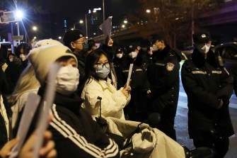 masked protestors outside