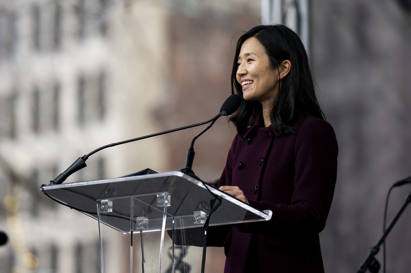 Boston Mayor Michelle Wu speaks at a podium