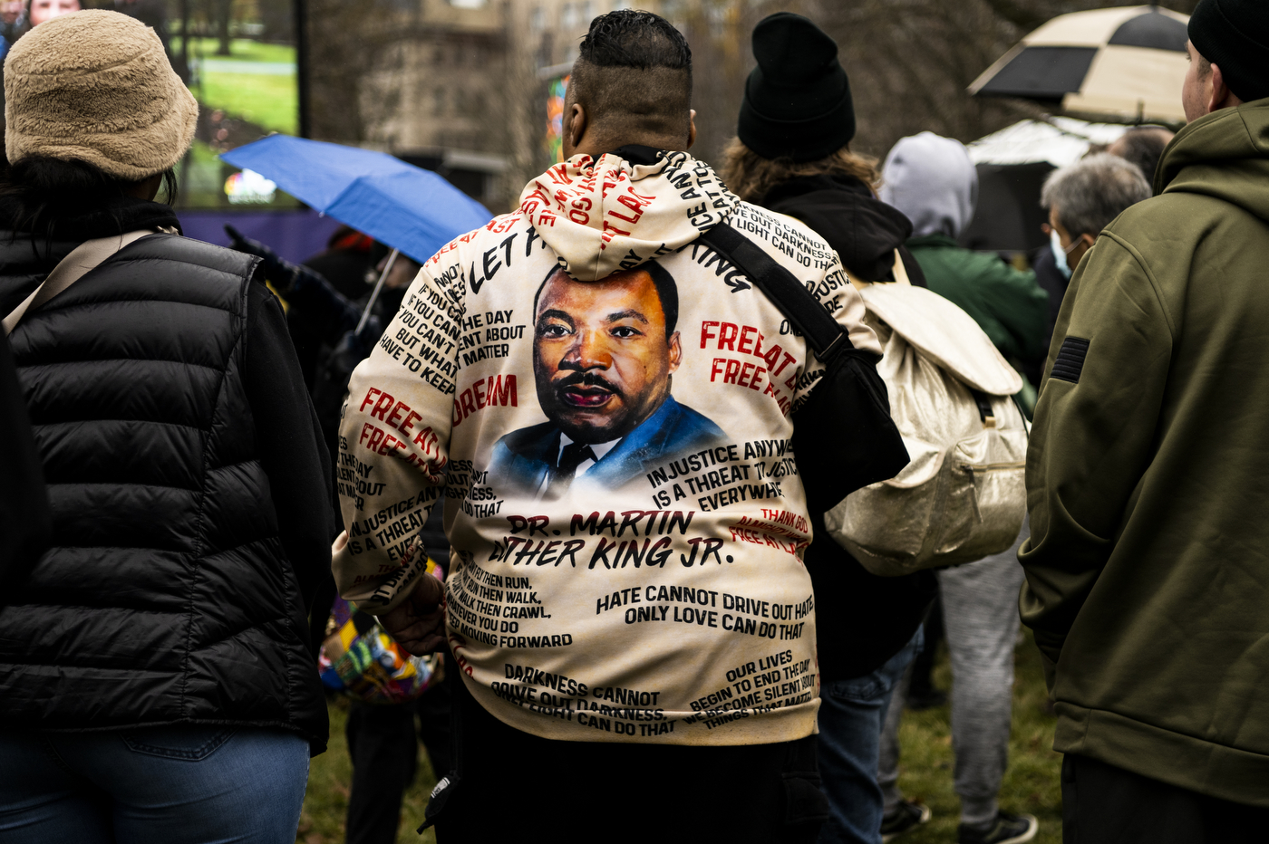 The back of a person's jacket, featuring an image of Martin Luther King Jr. 