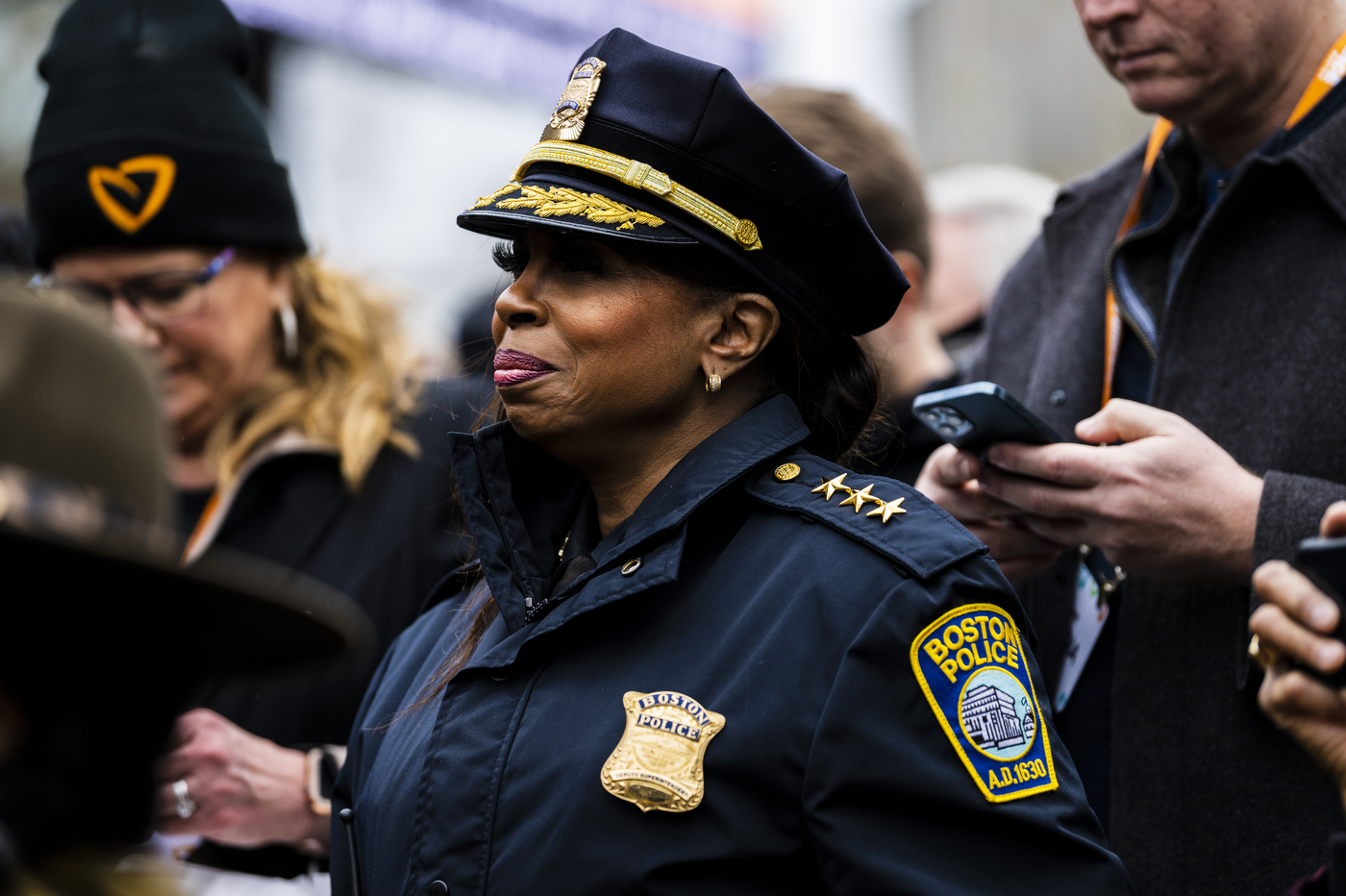 A Boston Police Officers smiles