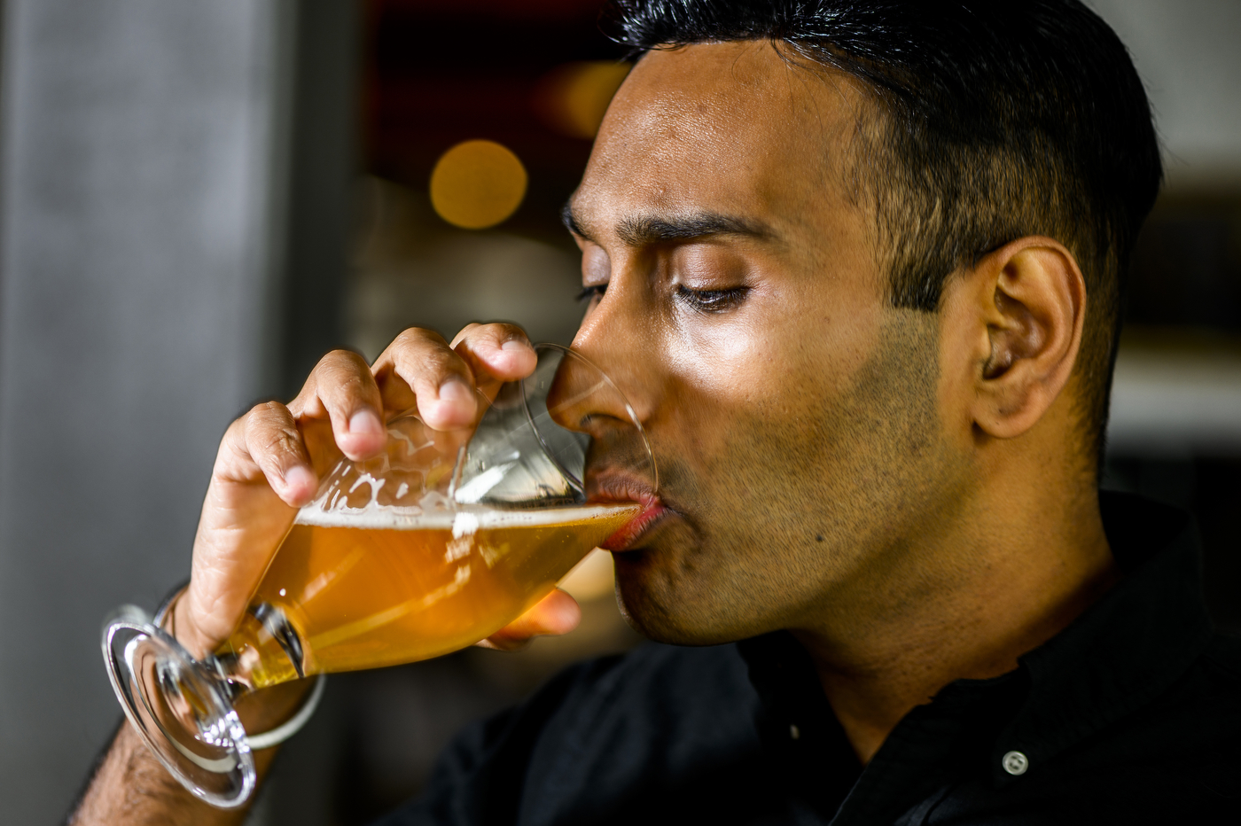 Vanit Sharma drinking Rupee Beer