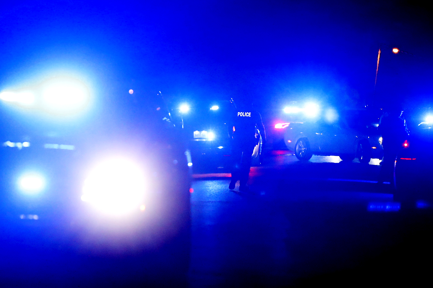 police cars with their flashing lights on