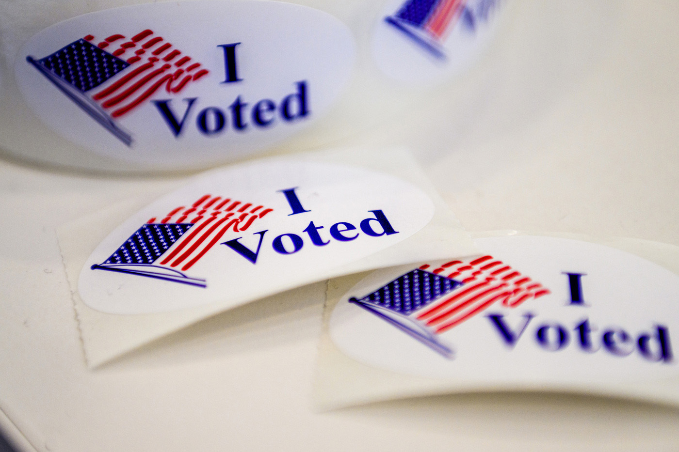 'i voted' stickers on a white table