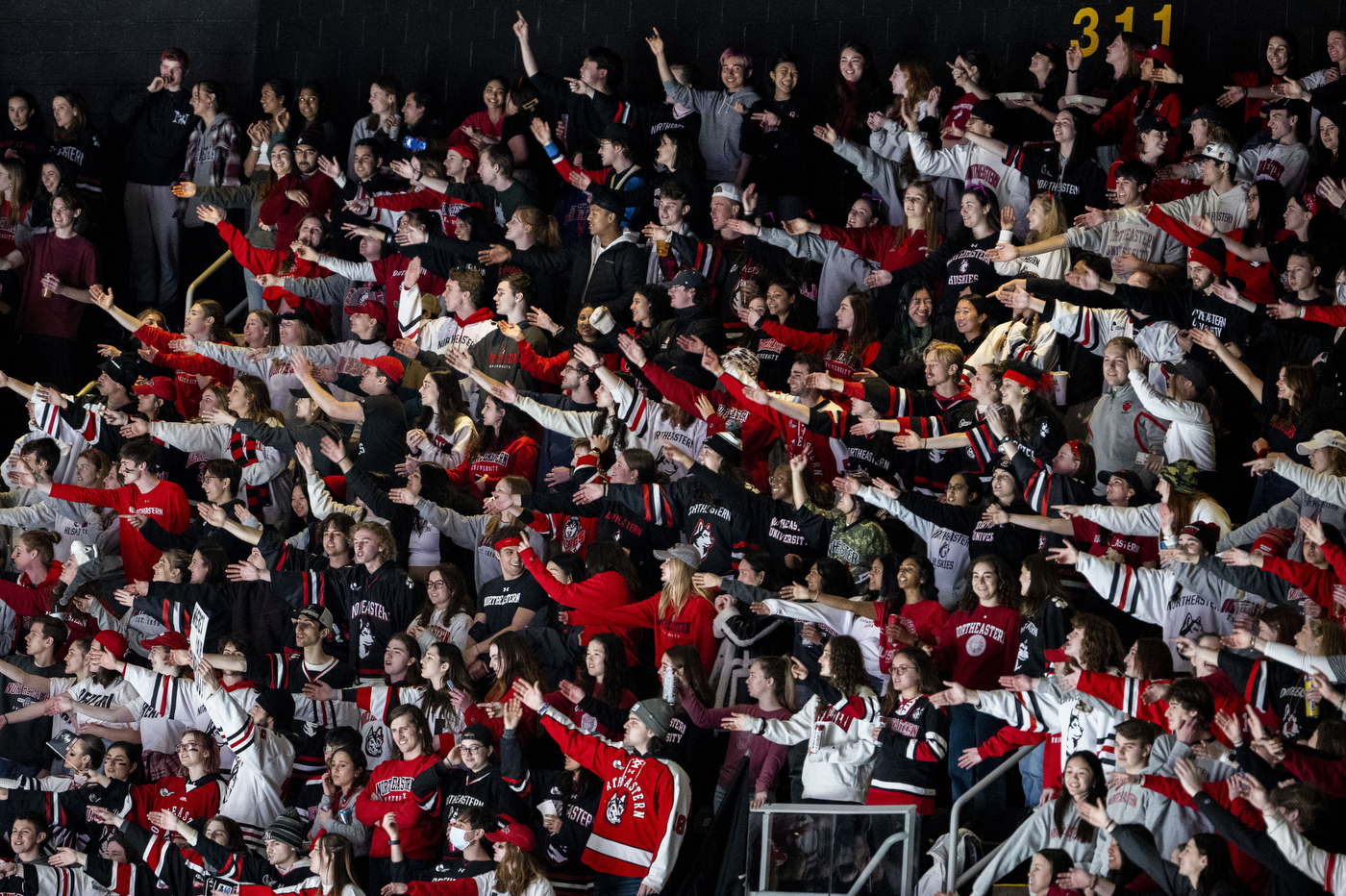 Northeastern fans in red, white and black fill the stands of TD Garden Monday night.