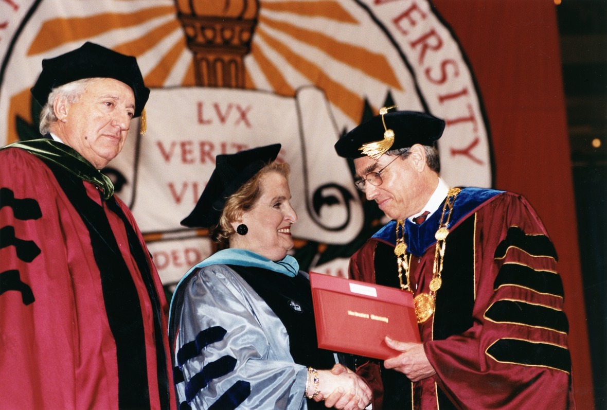 Madeleine Albright (center) receives honorary Doctor of Public Service degree from President Freeland