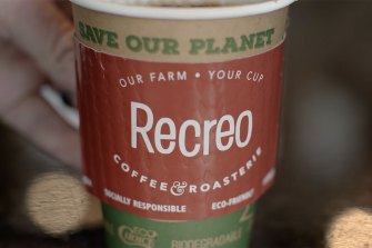 A cup of coffee with the company name Recreo