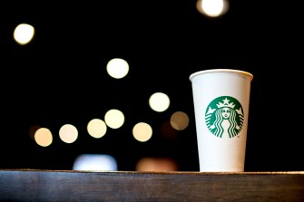 A cup with a Starbucks logo