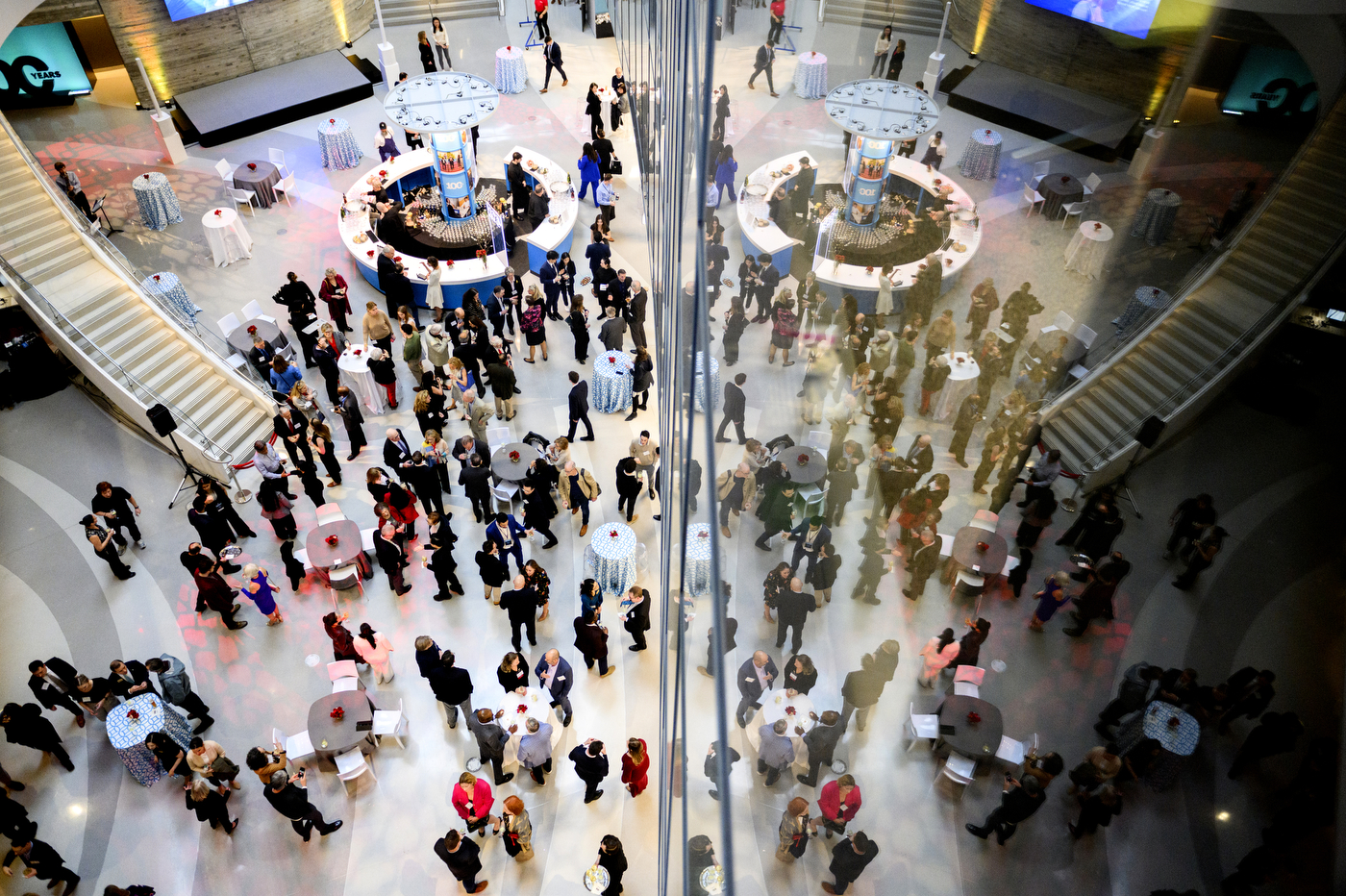 overhead shot of people celebrating D'Amore McKim's 100th Anniversary event in ISEC