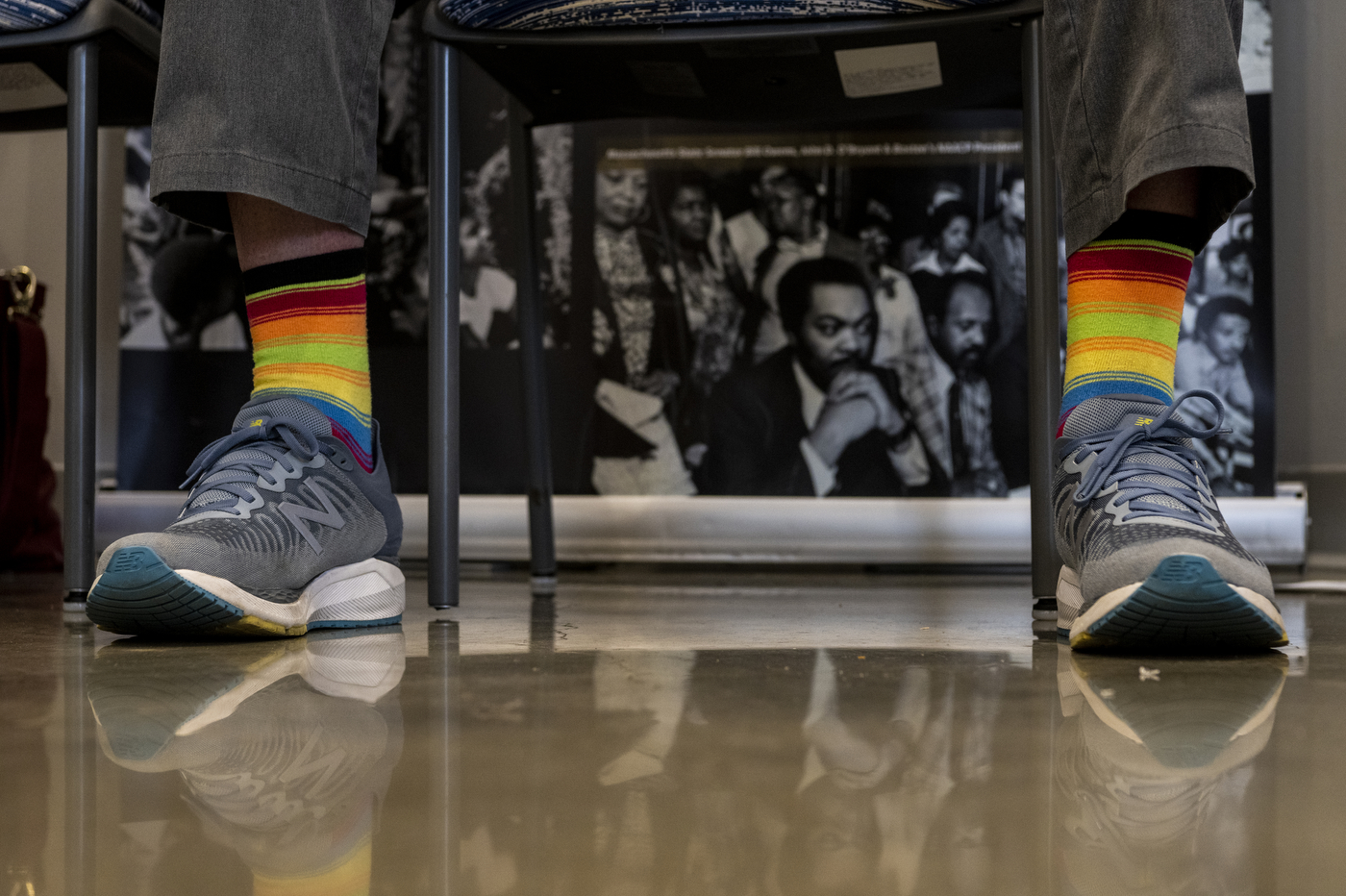 person wearing rainbow socks