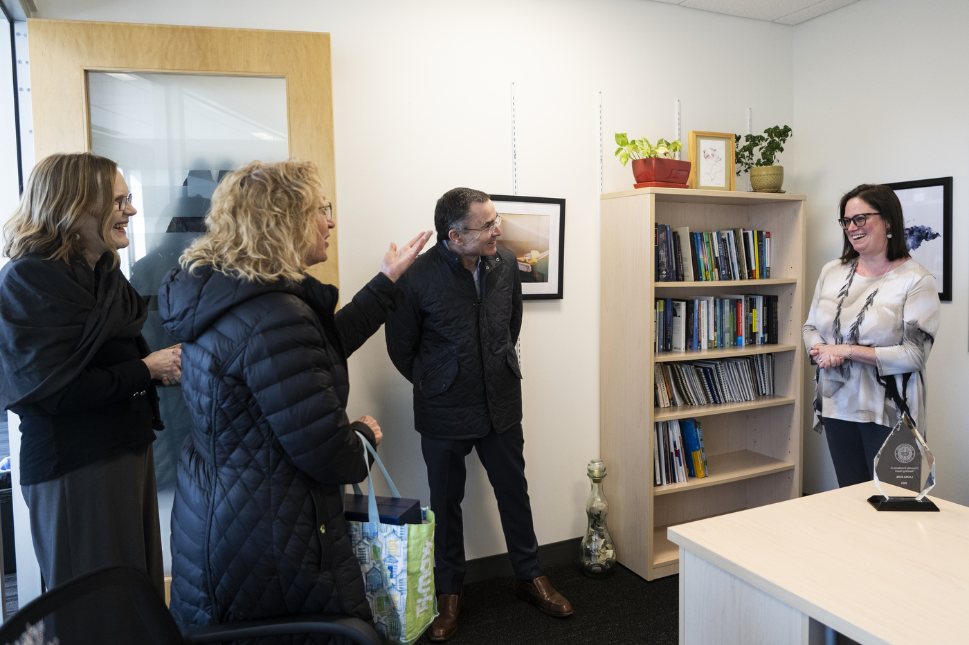 Professor Laura Kuhl being surprised in her office