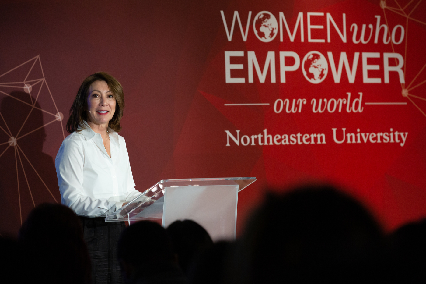 woman speaking at women who empower our world event at northeastern university london