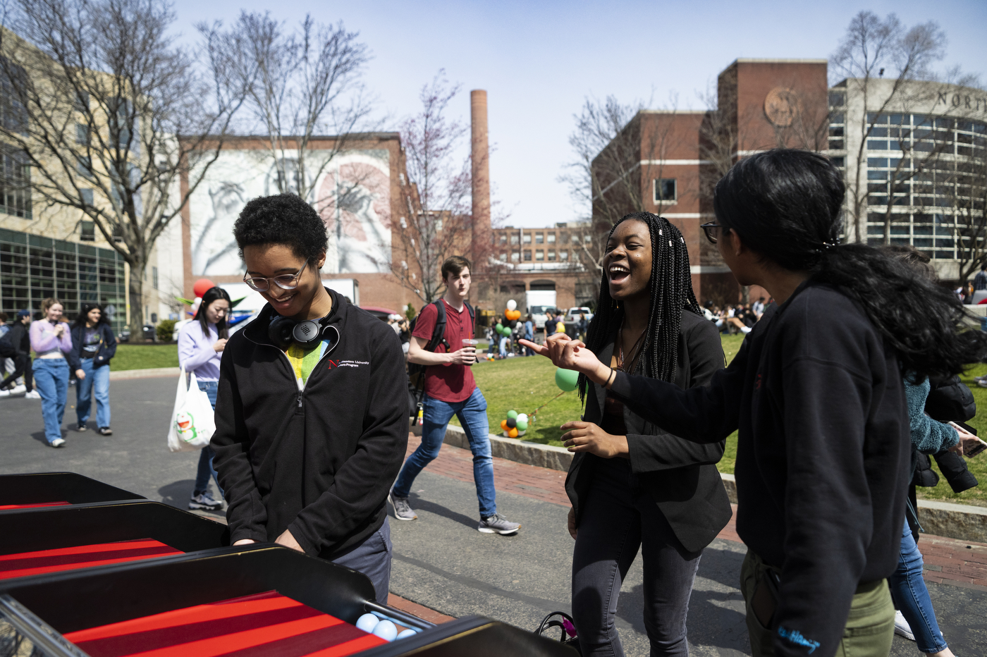 students playing games on Centennial Common