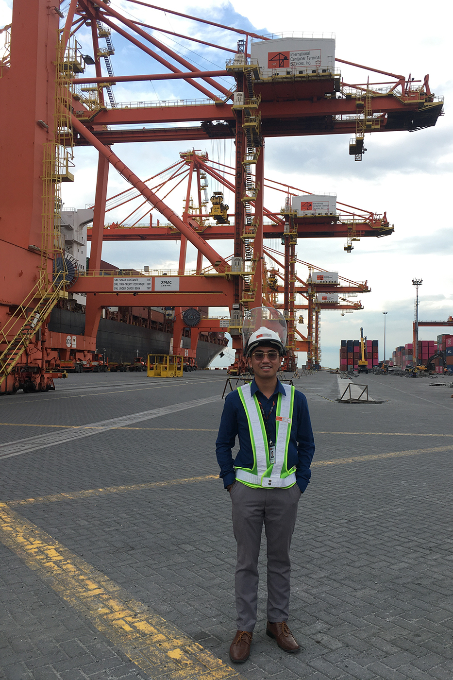 John Rivera on a shipping container port