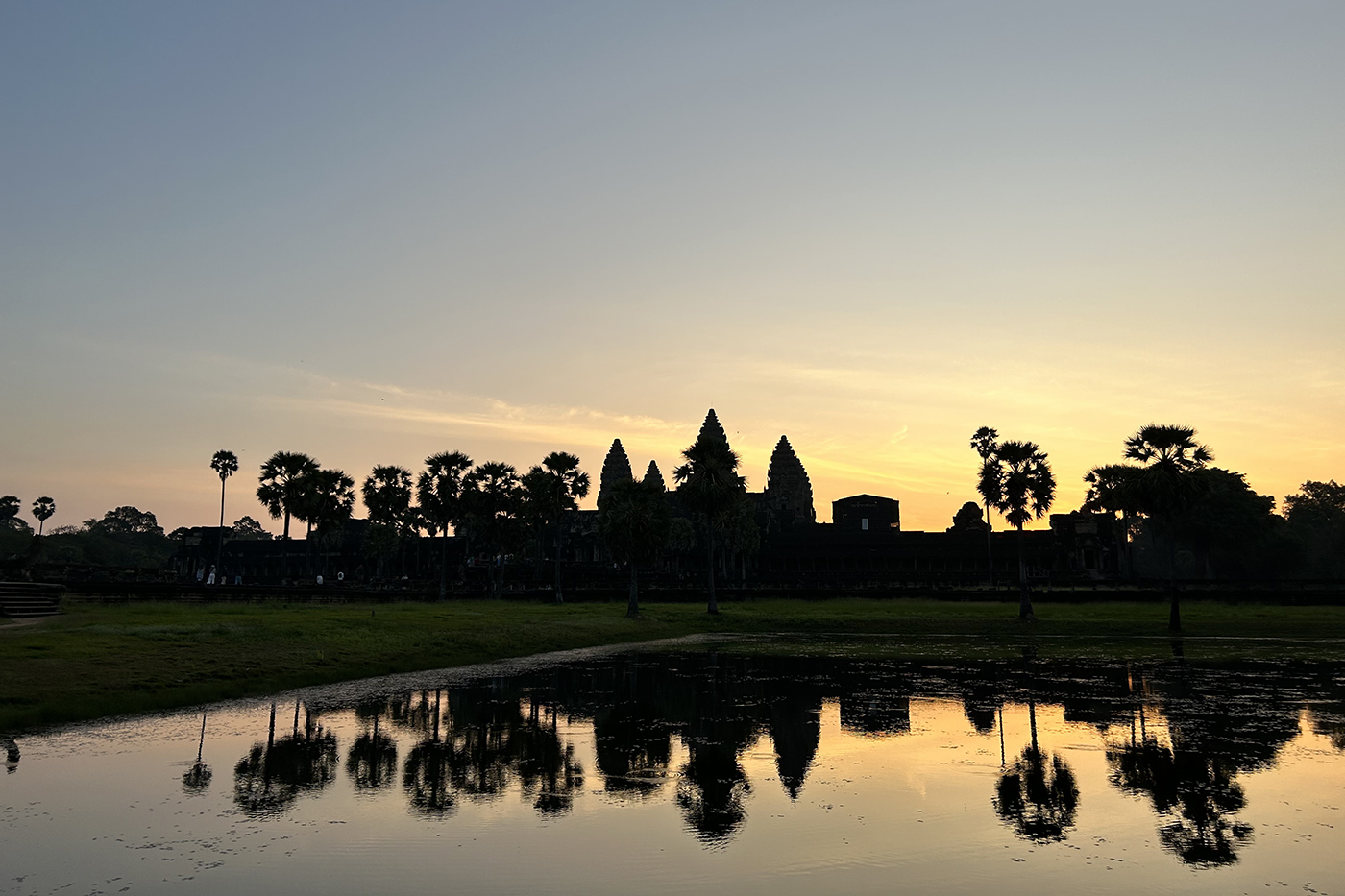 silhouette of buildings and trees in Cambodia