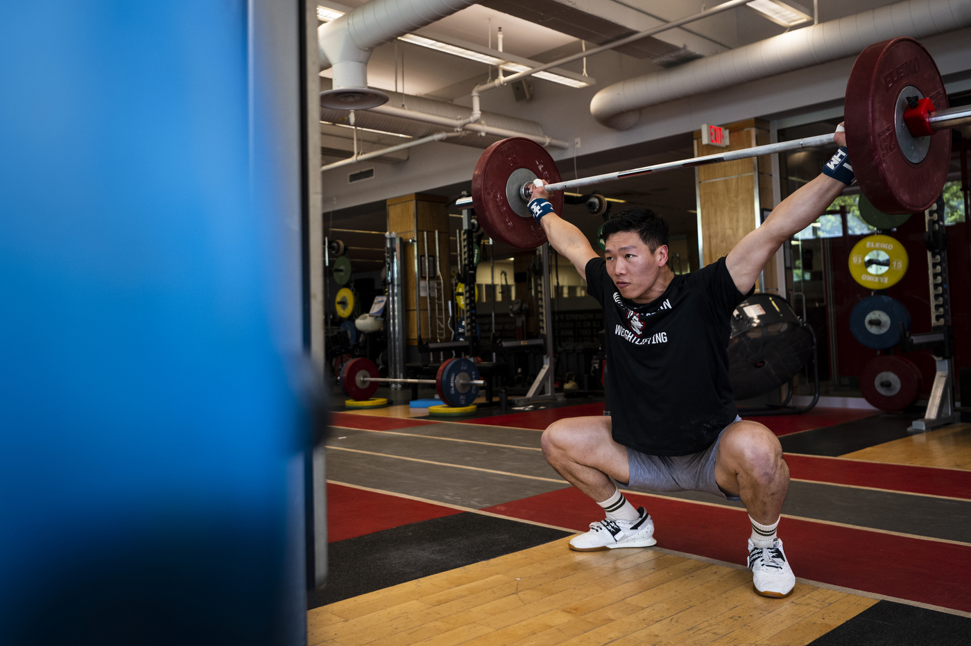 Matt Tung demonstrating a weightlifting movement