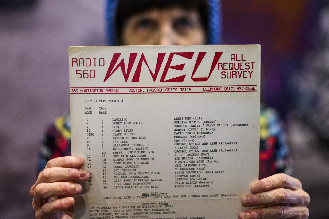 Donna Halper holding up a radio request survey