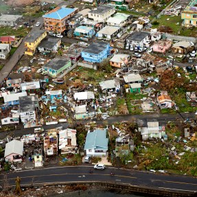 aerial shot of a Caribbean community devastated by a hurricane
