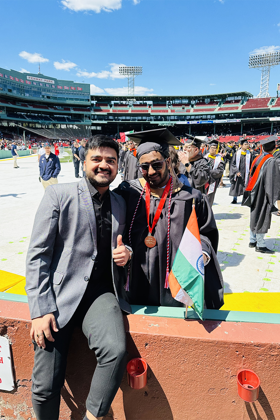 Pulkit and Hardik posing for a photo in Fenway park