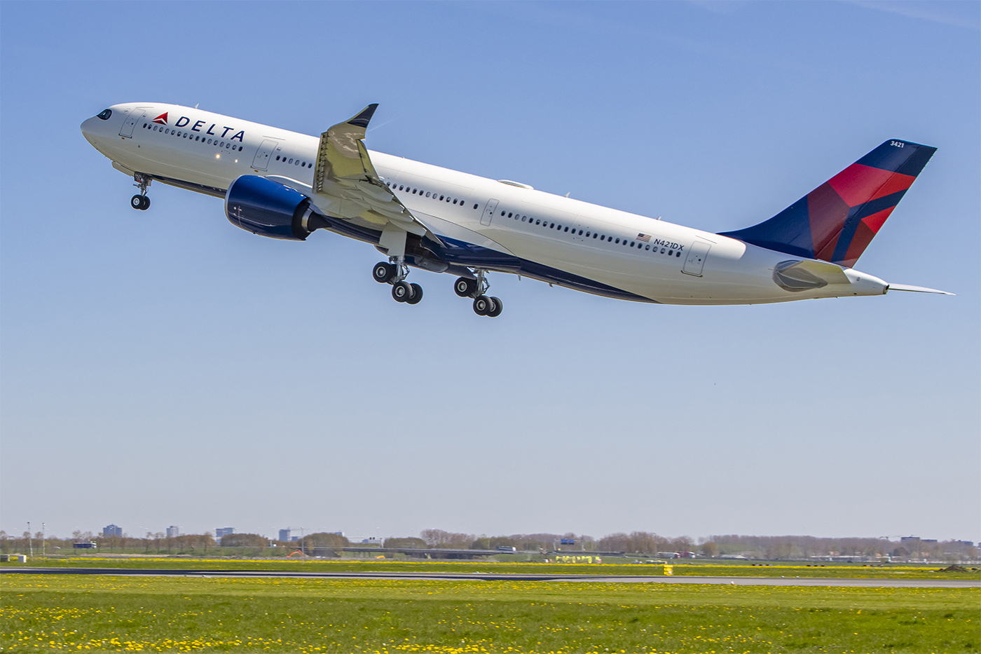 Delta Airlines airplane taking off from a runway