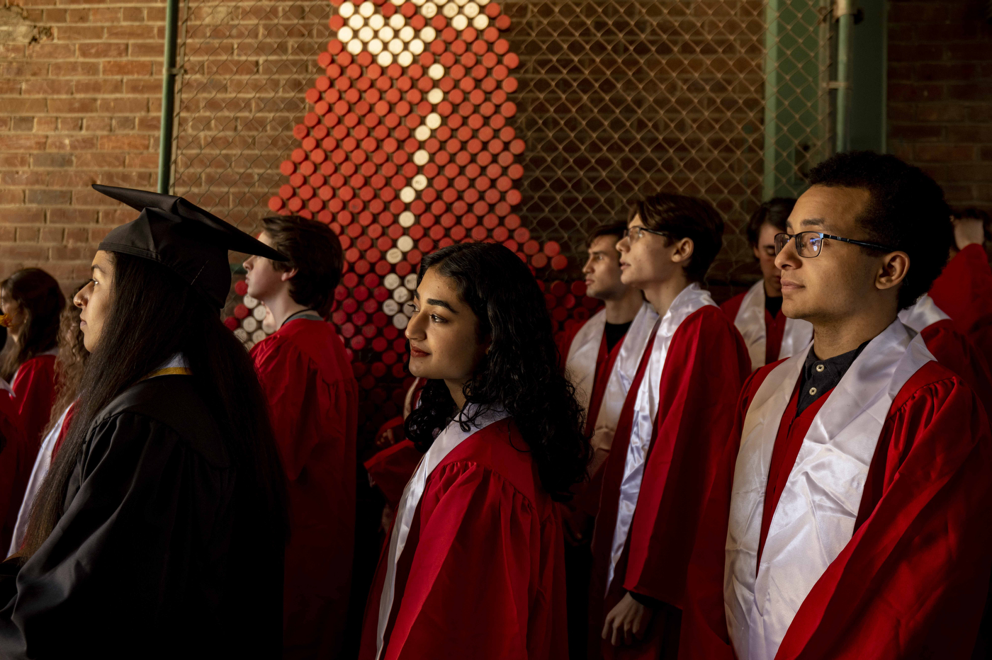 students lined up to walk out into Fenway Park for commencement