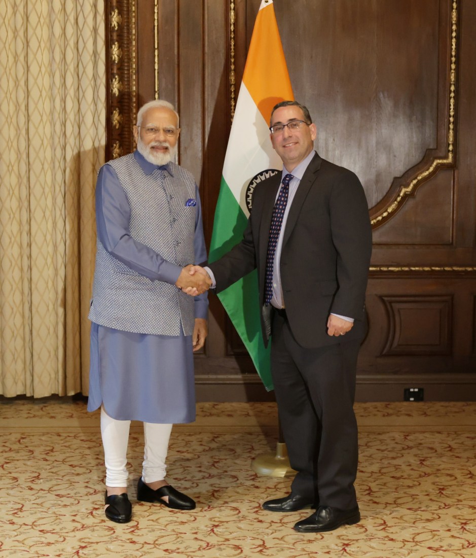 professor Max Abrahms shaking India Prime Minister's hand