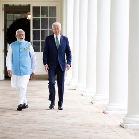 president Joe Biden walking with Prime Minister Narendra Modi