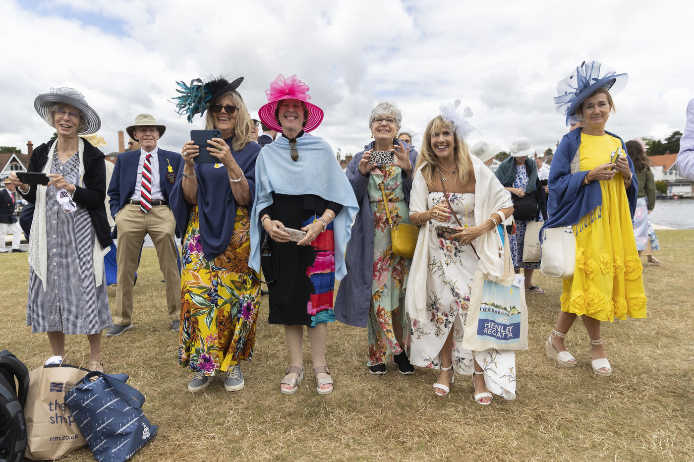 Henley Royal Regatta attendees wearing hats and dresses