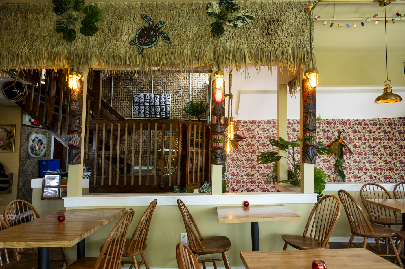 tables inside Scott Kirmil's tiki themed restaurant