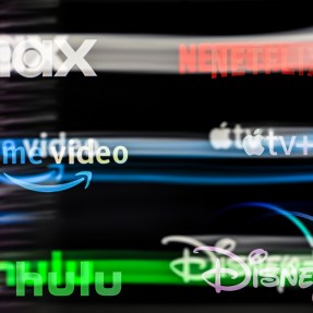 A blurred image of streaming service logos.