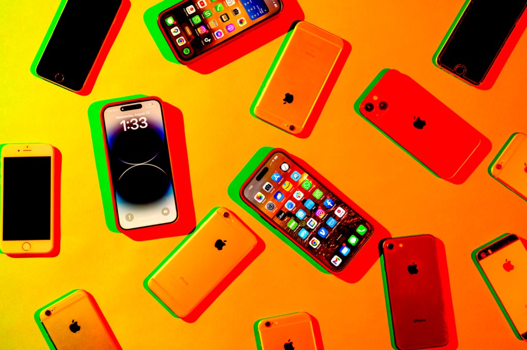 cell phones on an orange background