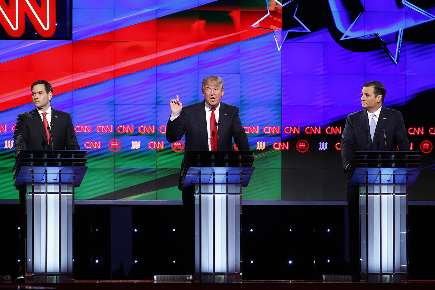 Marco Rubio, Donald Trump, and Ted Cruz in a debate in 2016