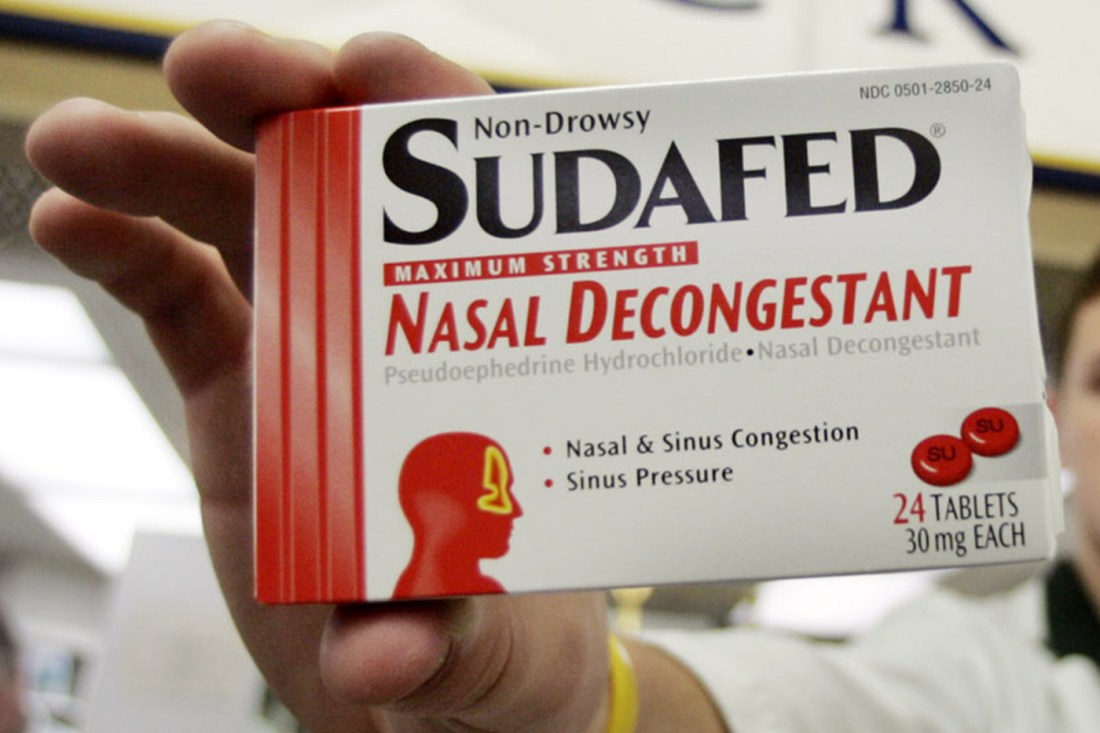 A box of non-drowsy Sudafed nasal decongestant.