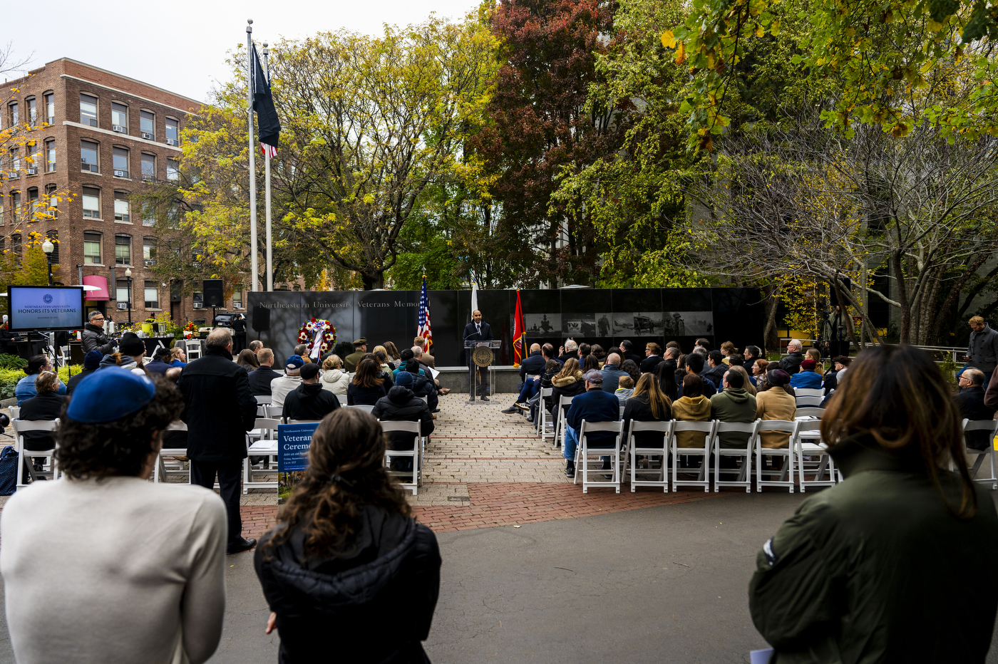 Speakers and audience members gathered at the Northeastern Veterans DAy ceremony.