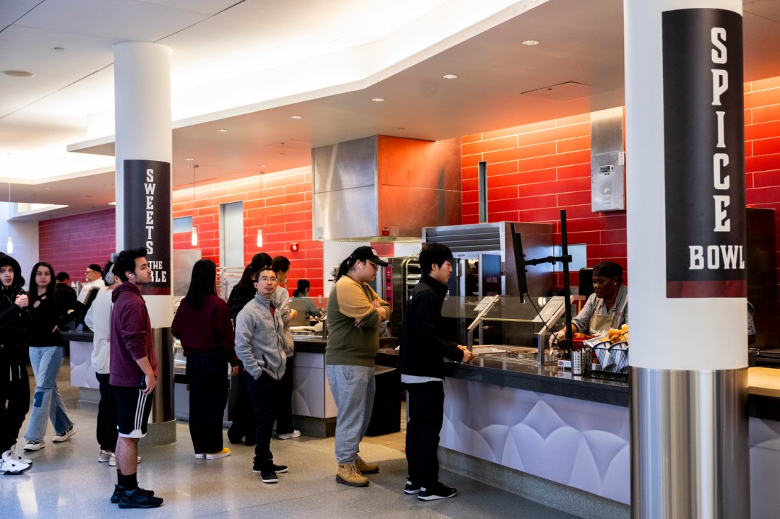 Students lined up at the United Table food hall. 