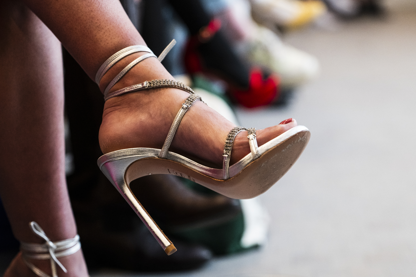 Student wearing Stuart Weitzman's $1 million diamond studded heels. 