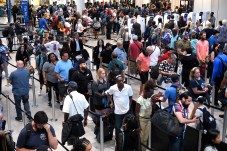 Lines of travelers waiting for TSA at the Orlando International Airport.
